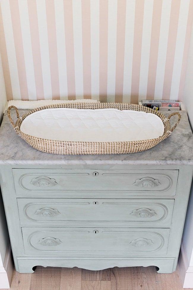 Designate a cozy area for diaper changing in your Nursery Nook