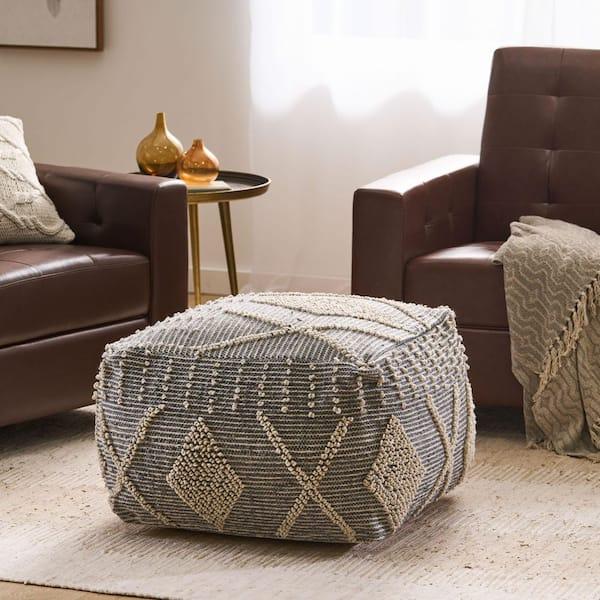 Include a‌ natural​ fiber pouf for extra seating ‍in your earthy​ living ⁣room