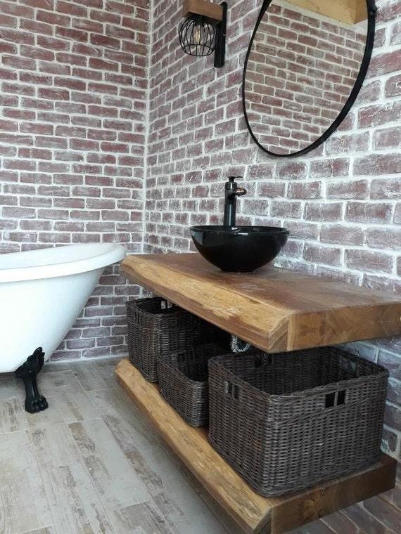 Use unexpected materials like reclaimed wood for shelves in your ‍eclectic bathroom