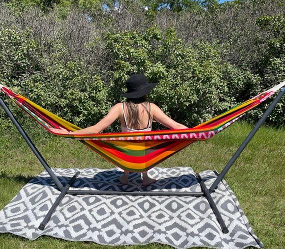 Set up‍ a hammock for⁣ relaxation in your ‌backyard