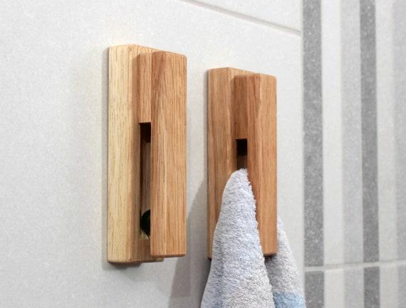 Use wooden hooks for towels, adding​ functionality to⁤ your stylish wooden bathroom