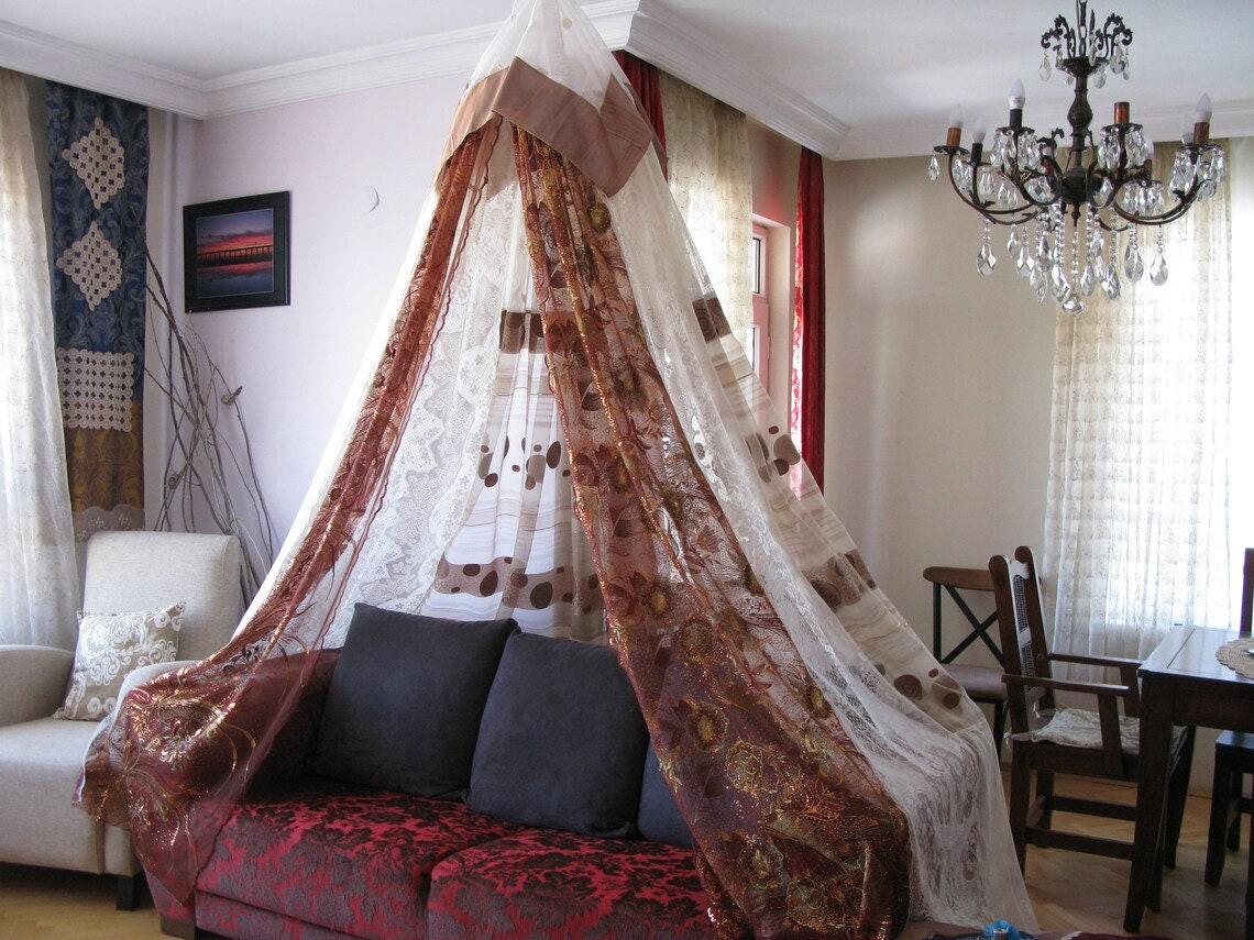 Add a dreamy canopy or curtain to create a whimsical vibe in your Boho Living ⁤Room