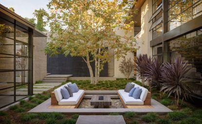 Build ‍a sunken seating‍ area‍ for⁢ intimate backyard​ conversations