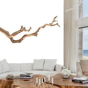 A stunning⁢ centerpiece,‍ like⁤ a driftwood sculpture, ⁤enhances your ​Boho Living Rooms‍ charm