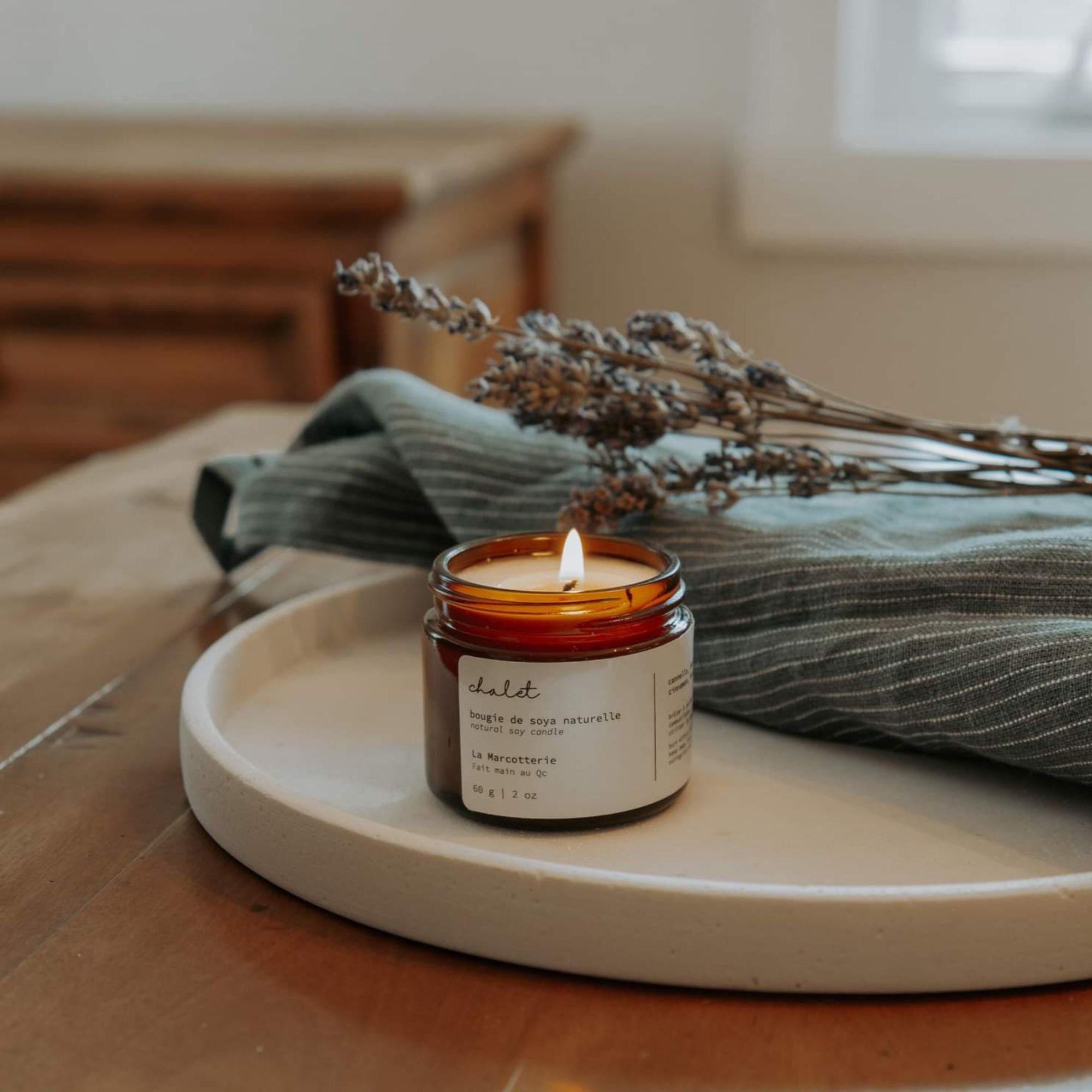 Scented candles enhance tranquility in a serene Chalet Bathroom