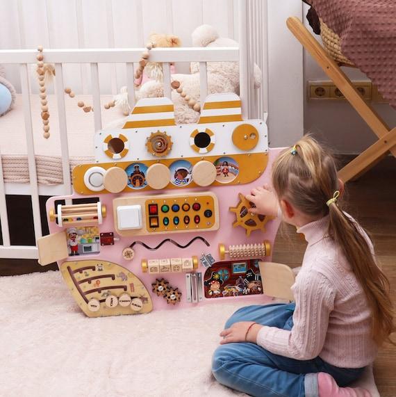 Sensory toys encourage exploration in a girls ⁢nursery​ environment