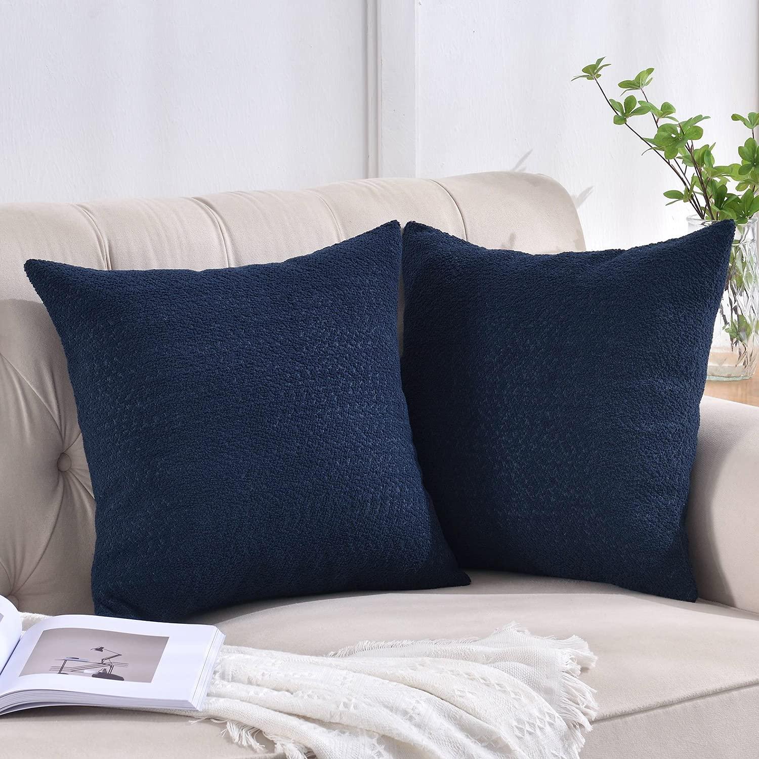 Incorporate textured pillows ​for depth in your blue living room