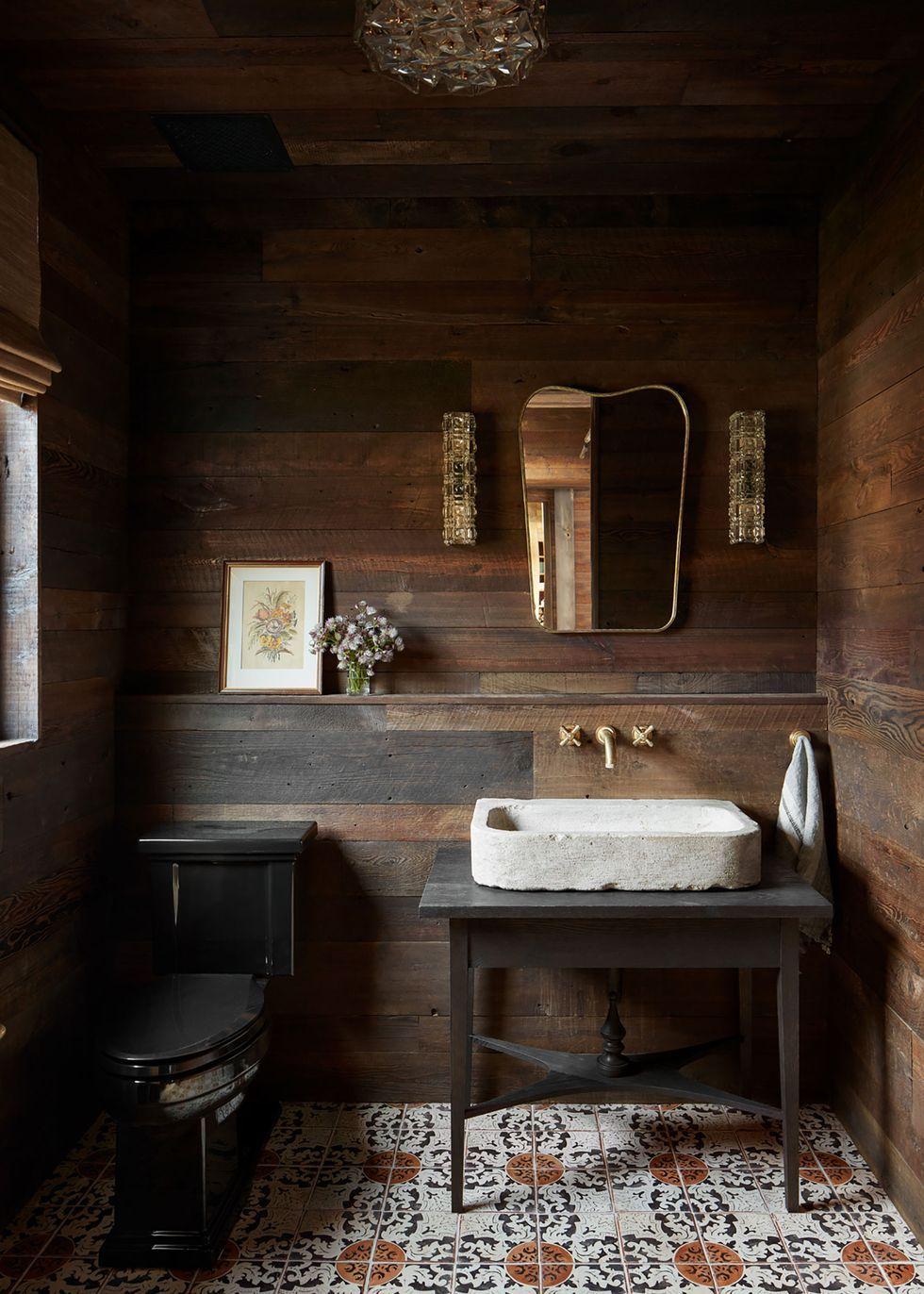 Warm wooden tones can make a small bathroom ‌feel larger and more inviting