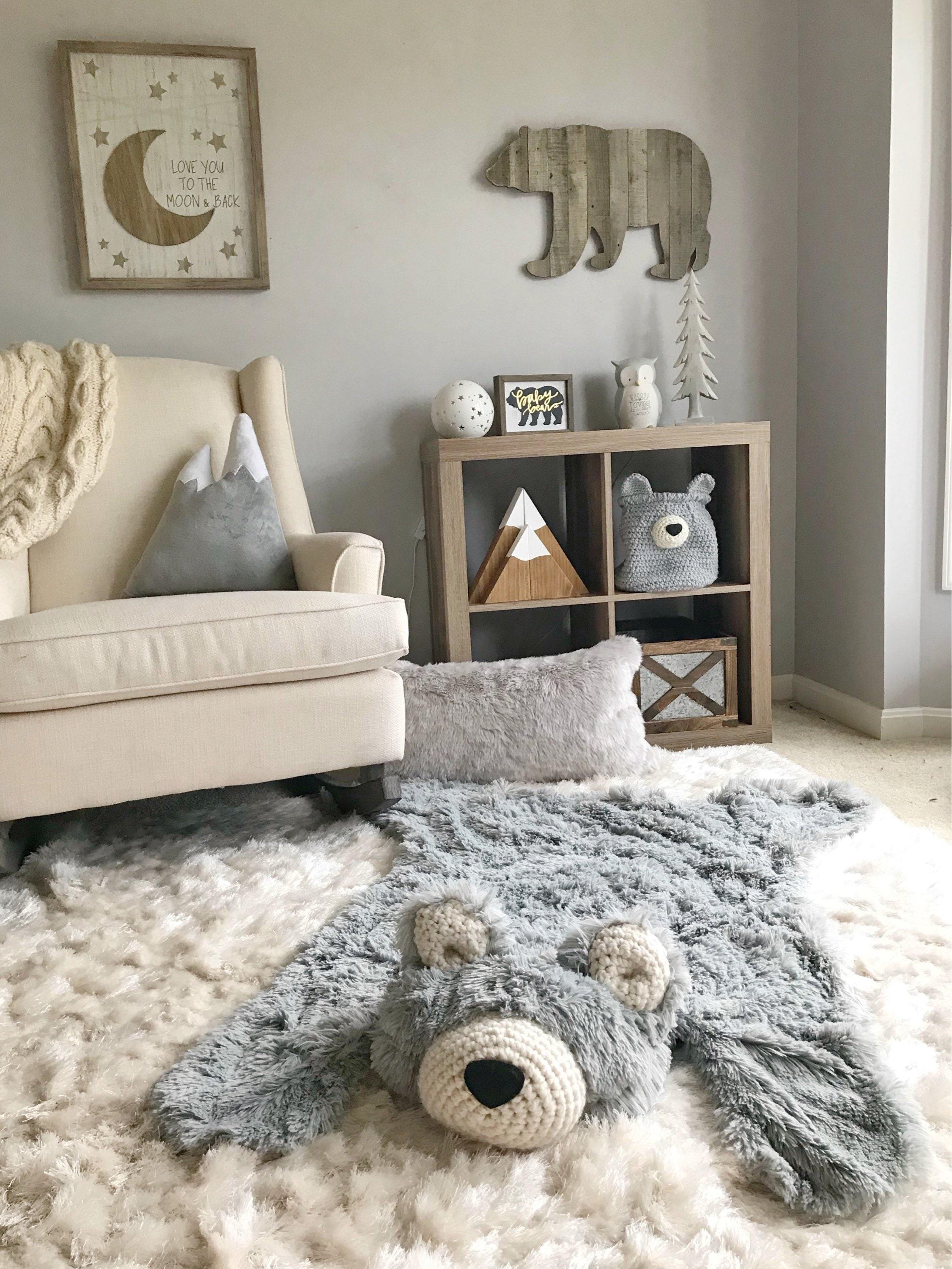 Opt ​for‌ a statement rug to define the space​ in your Nursery Nook