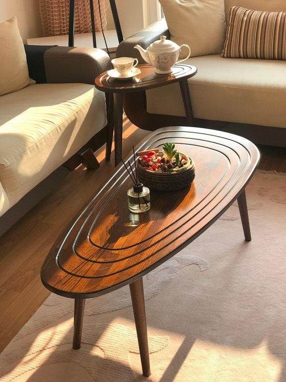 Incorporate a statement piece, like a mid-century‌ coffee⁣ table, for your vintage living room