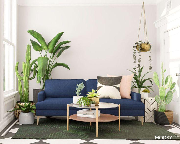 Incorporate plants to breathe life into your blue living room