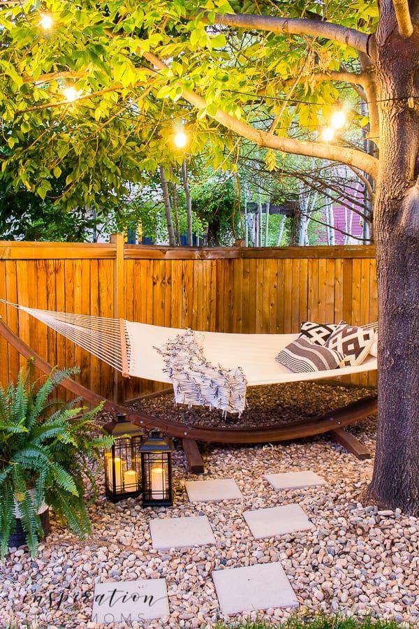 Add a hammock for relaxation in your small backyard oasis