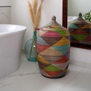 Layer textures with woven baskets and ceramic pots in your eclectic bathroom decor