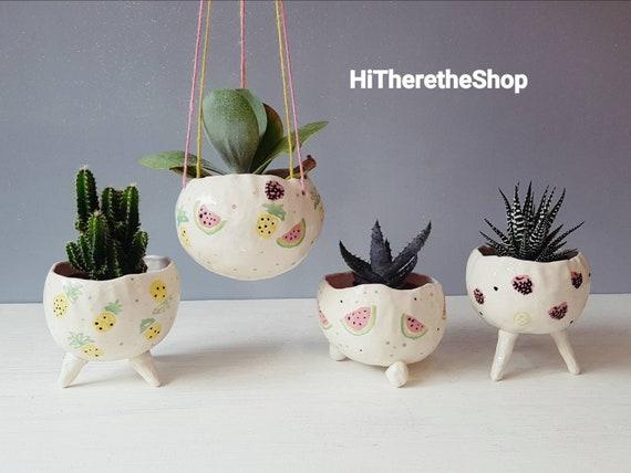 Use handmade pottery for‌ unique planters in your <a href=