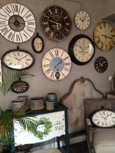 Use a whimsical vintage clock as a focal point in your living room design