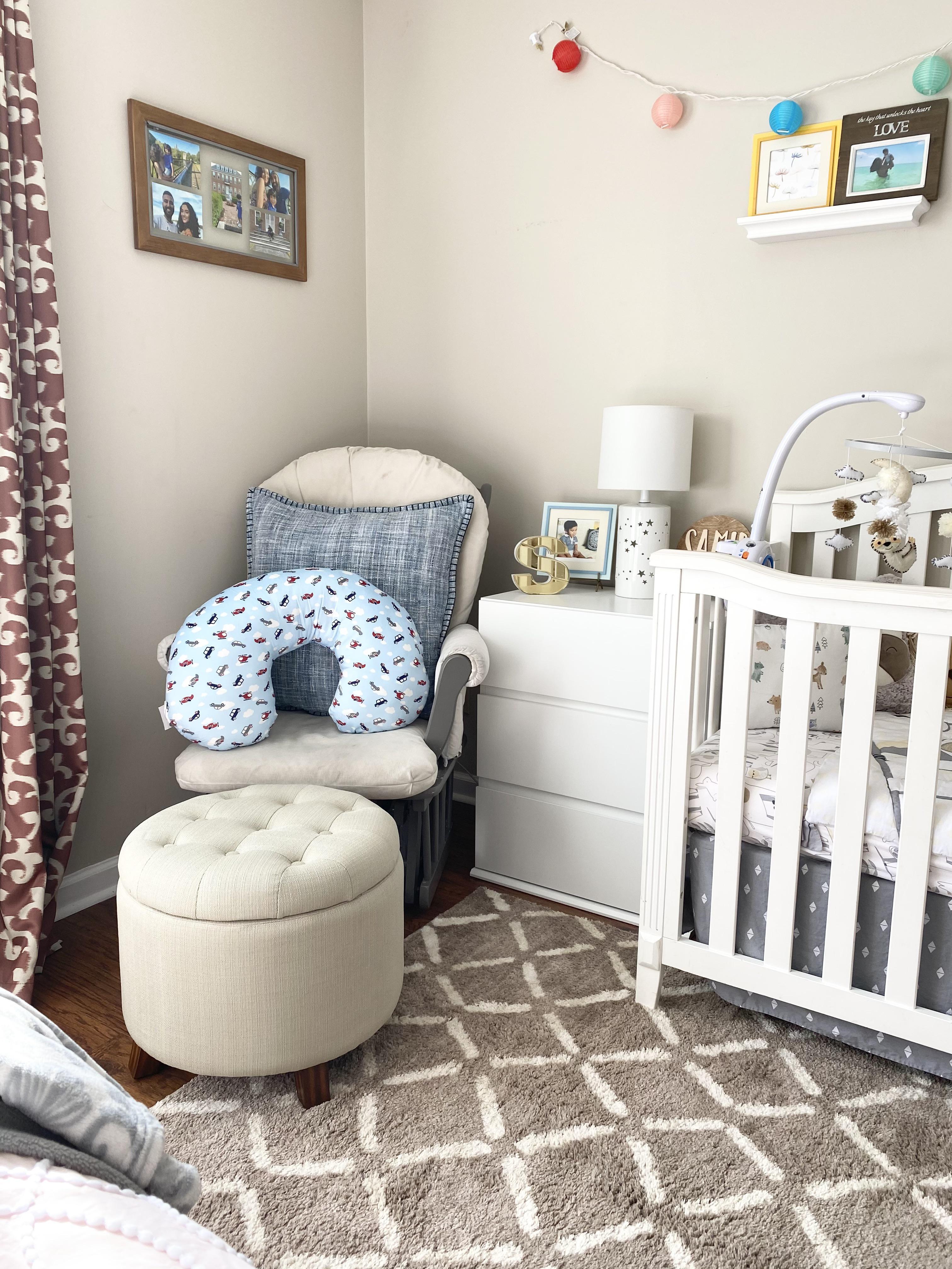 A small side table holds essentials within reach in the ‌Nursery Nook