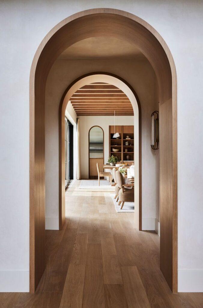 Archways create visual interest in expansive interior design