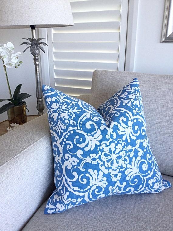 Use patterned blue cushions to enhance your blue living room