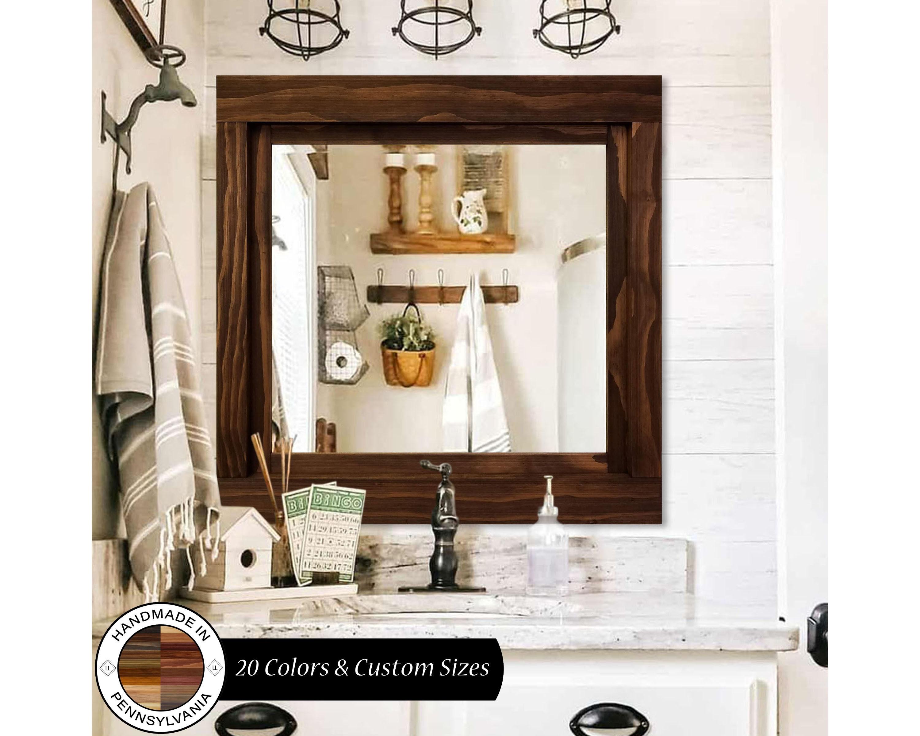 Vintage mirrors serve as eye-catching focal points in your farmhouse bathroom