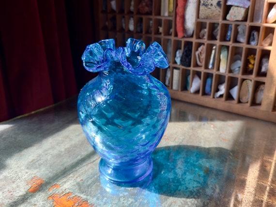 Accessorize with vintage blue glass decor for ​charm