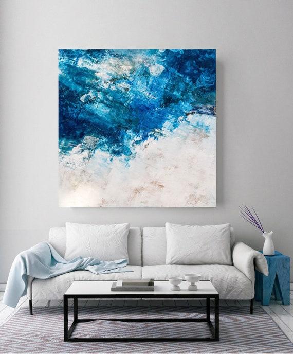 Inspire creativity⁤ with ​a vibrant abstract painting in your⁣ blue living room