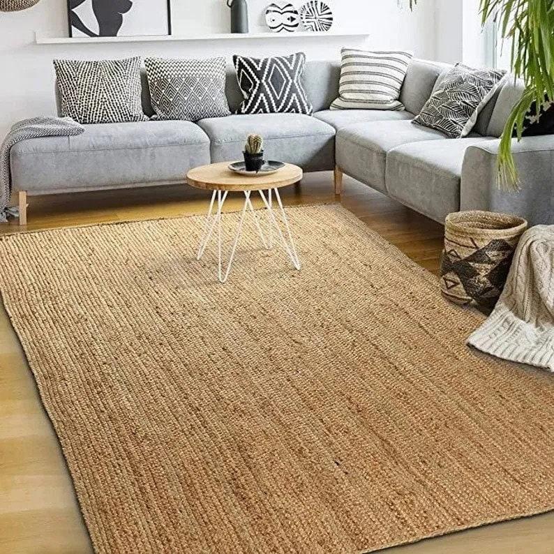 Anchor⁤ your earthy living room with a​ natural fiber rug ‍for added warmth