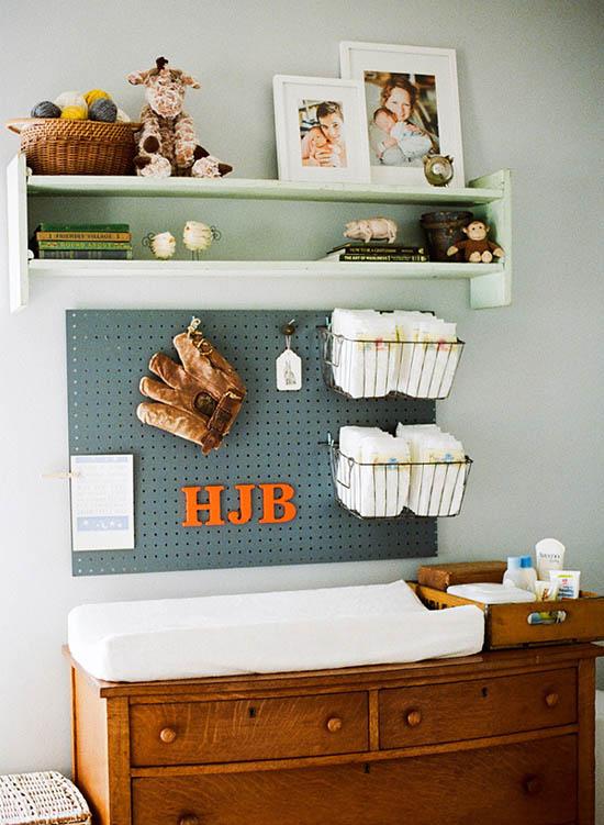 Create⁢ a pegboard wall ⁤for ‍versatile⁢ storage ‌in small ⁢nursery