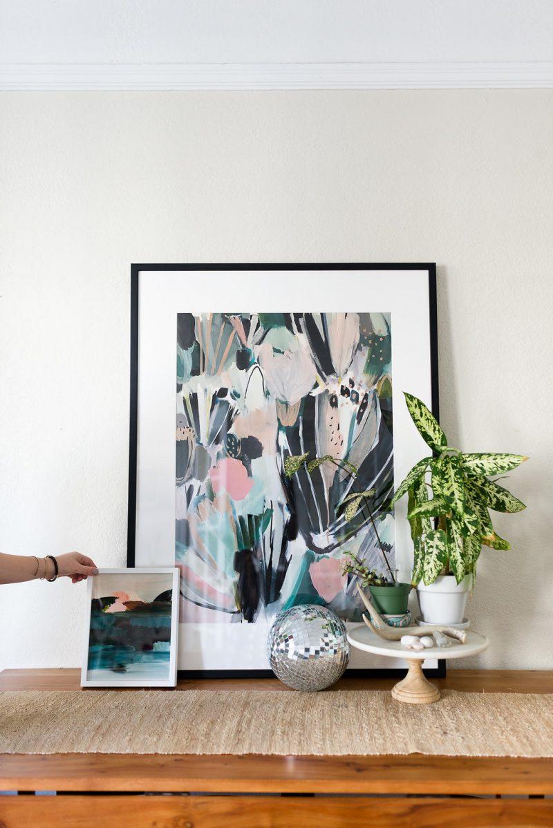 Curate a ​gallery wall for a personalized interior ⁢design statement