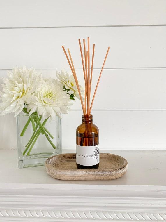 Natural reed diffusers to fill your boho bathroom with fragrance