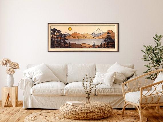 Hang landscape art to bring outdoor beauty into your Earthy Living Room