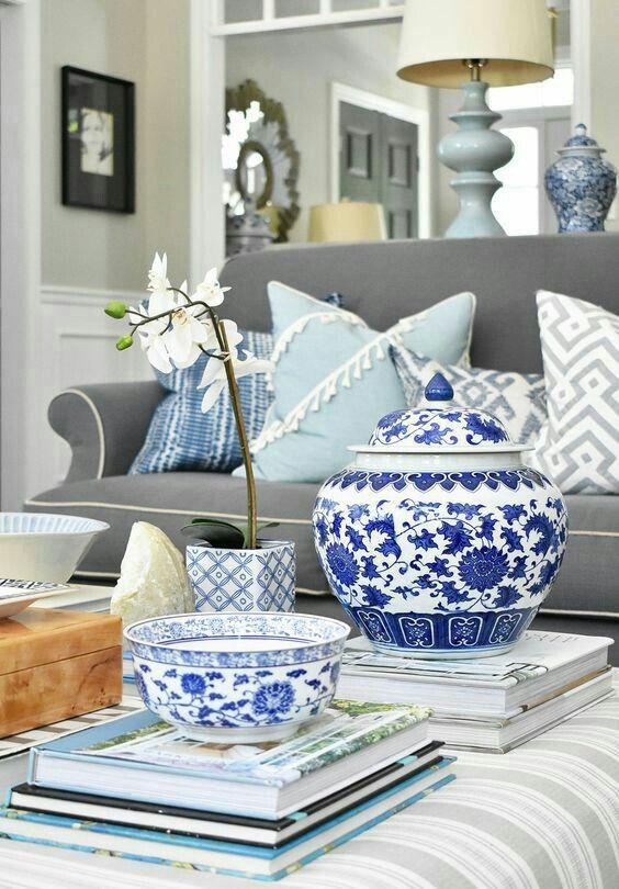 Incorporate blue-themed ceramics for subtle ⁤sophistication in your living room