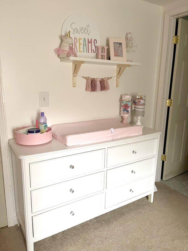 Choose a compact dresser to maximize storage in your small nursery