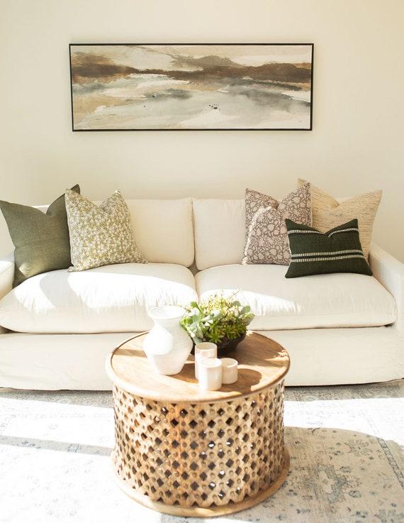 Use‌ linen throw pillows for comfort and a touch of elegance in ‍your earthy living room