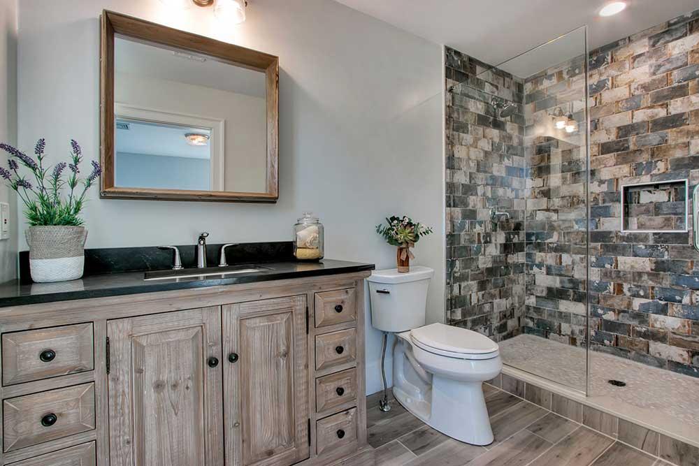 Embrace serenity with a wooden bathroom ‌featuring reclaimed wood for a rustic touch