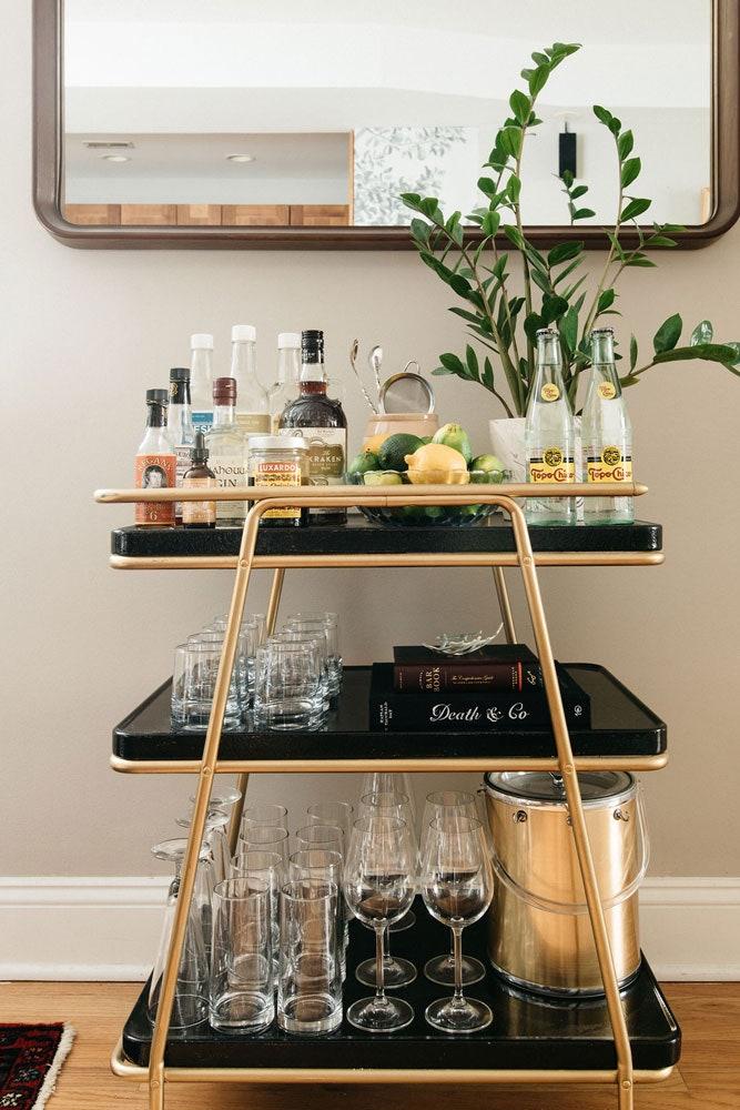 Incorporate a small bar cart for entertaining on your Screened Porch