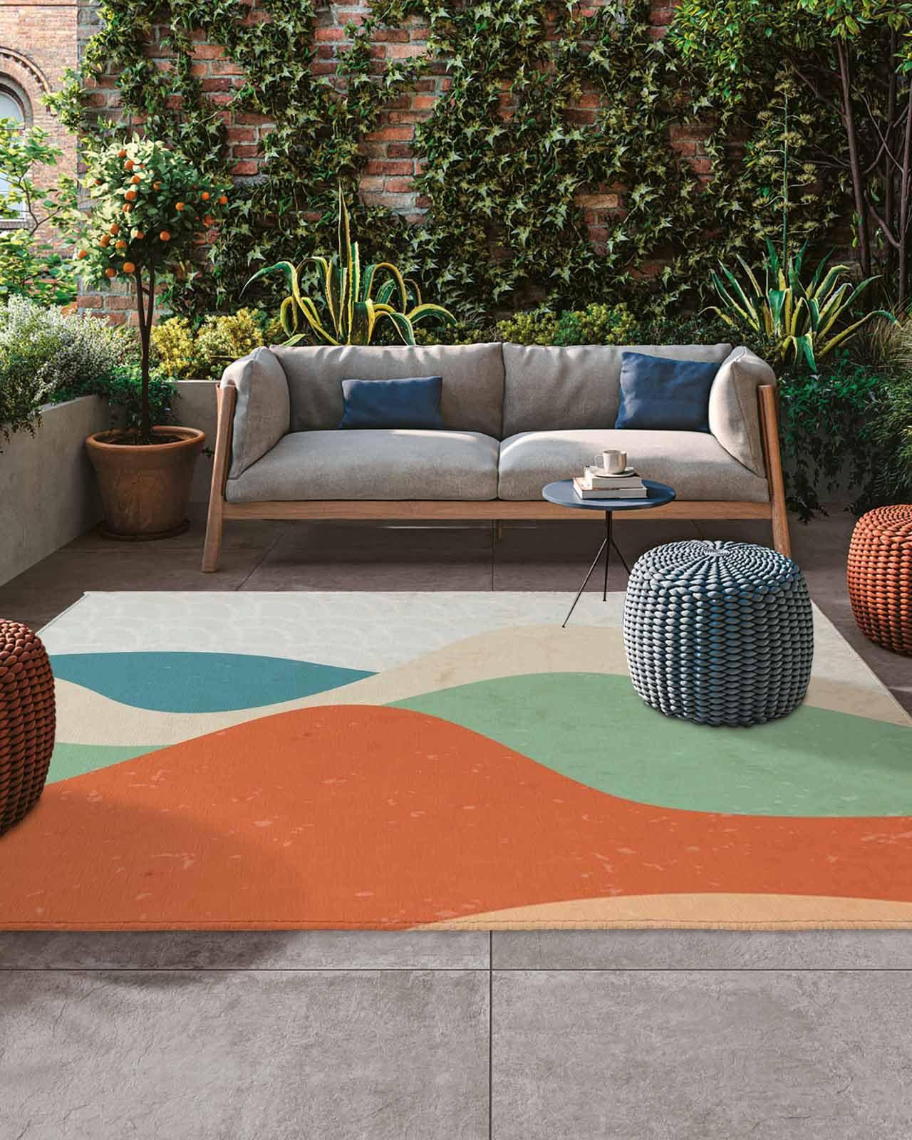 Add a ‌stylish outdoor⁤ rug for⁣ comfort in your⁣ backyard