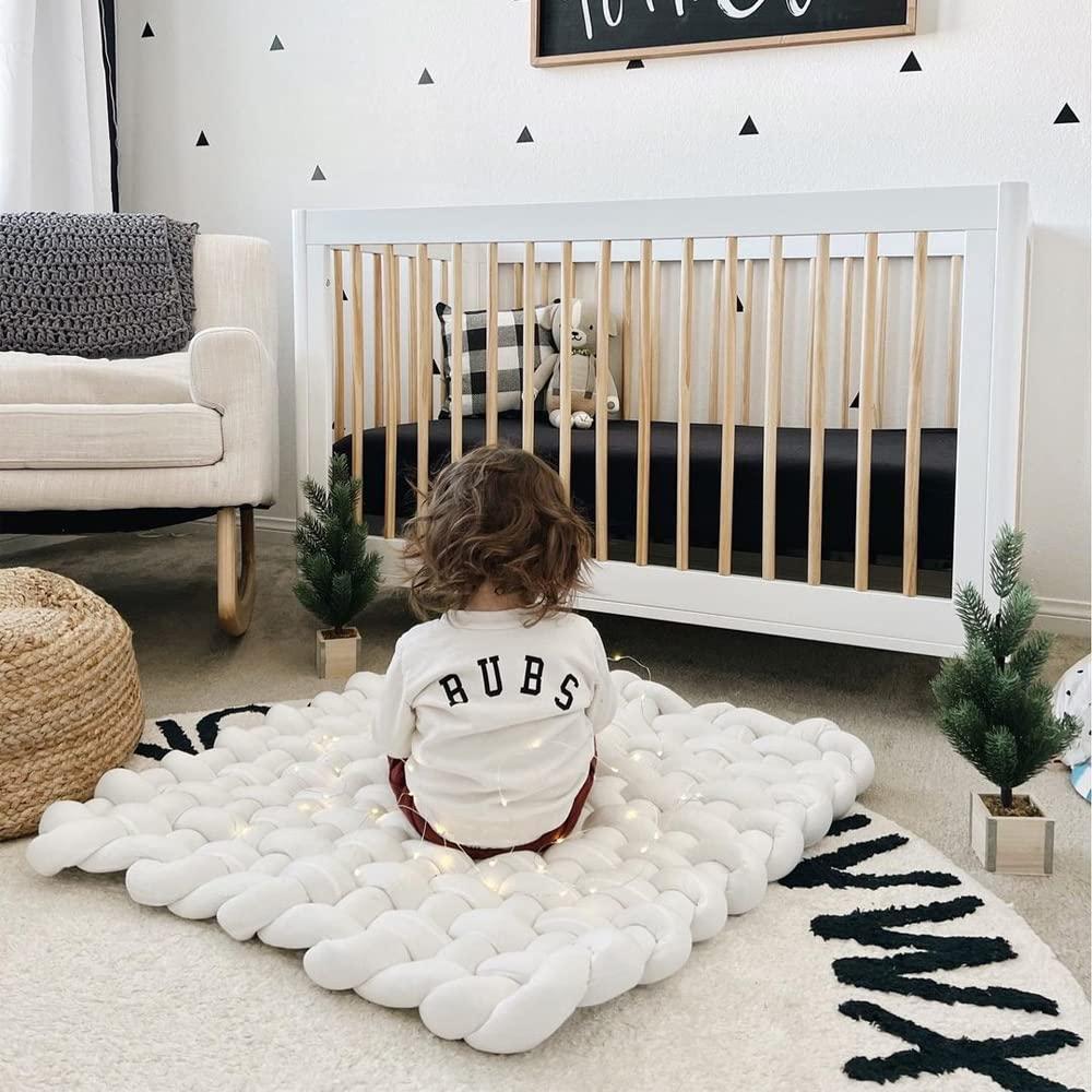 An⁢ adorable play mat ⁣ensures⁤ fun and safety in your Nursery Nook