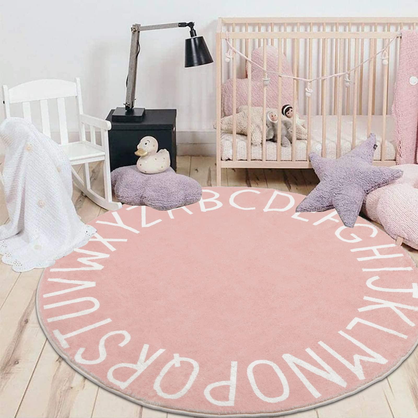 Choose a round rug to soften the small nurserys edges