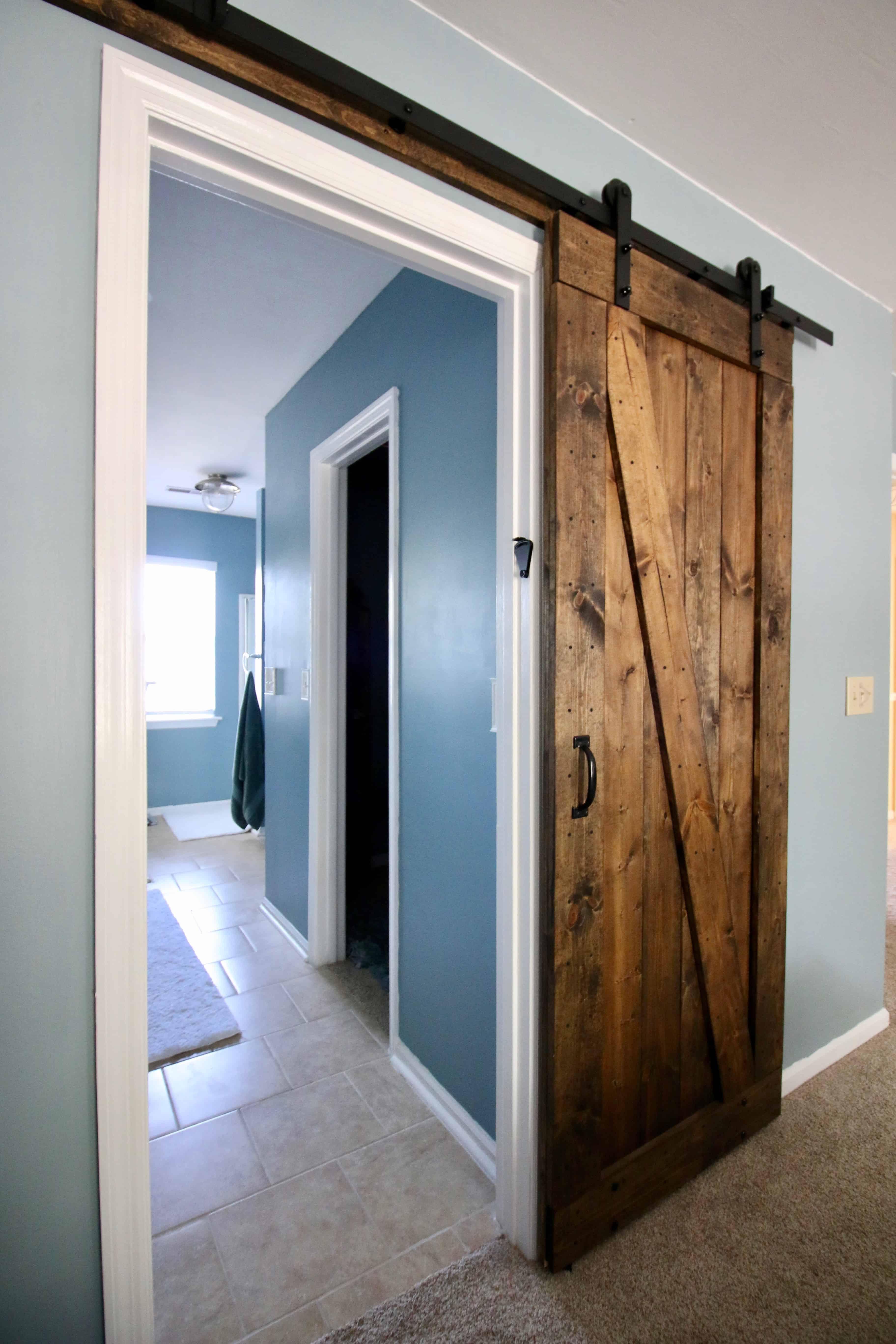 Install a barn⁤ door for a​ stylish and practical farmhouse bathroom entrance