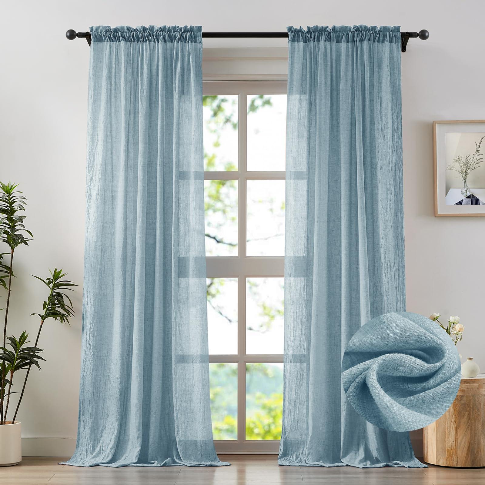 Introduce natural light with sheer curtains in ⁤your‍ blue living room