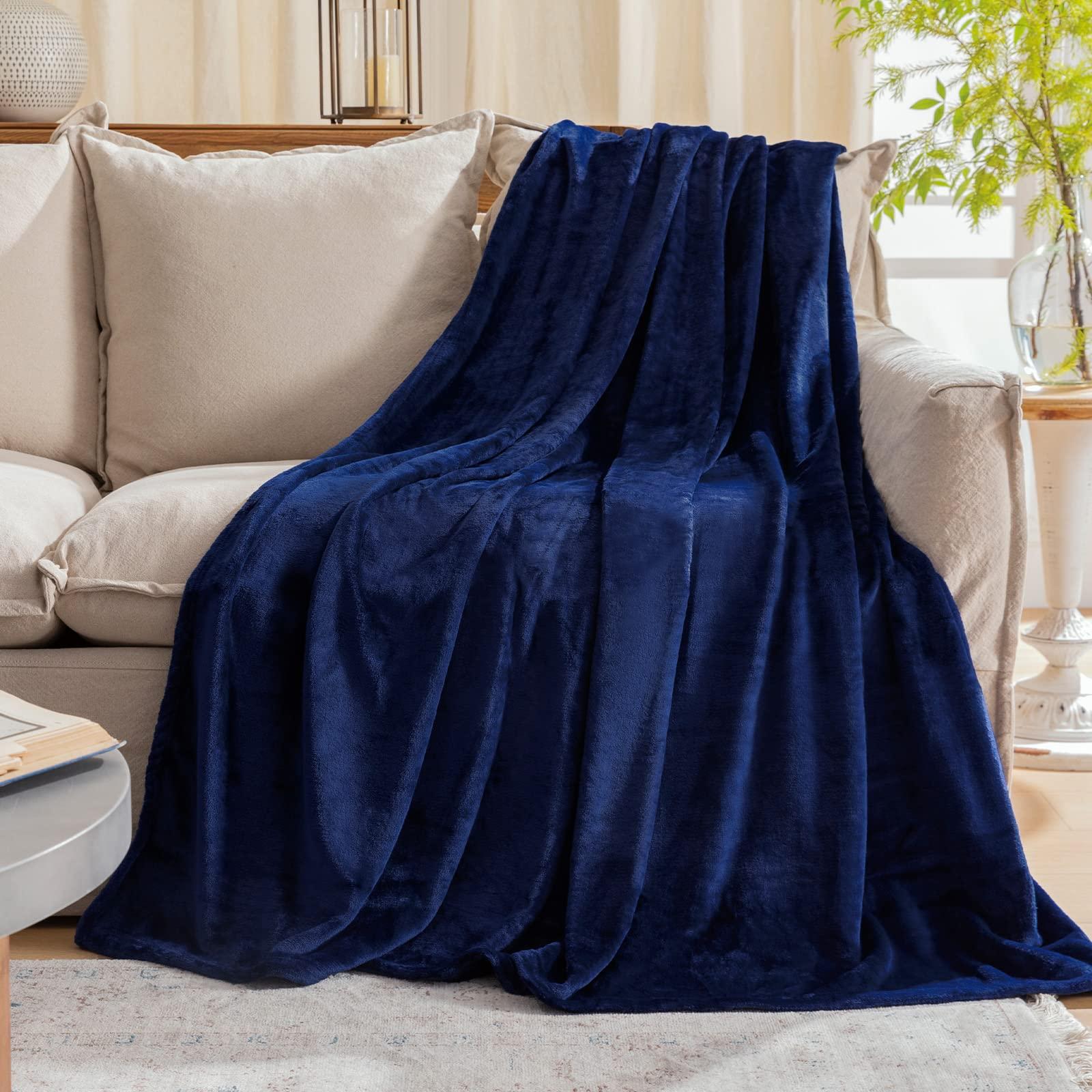 Add plush blue throw blankets ⁤for cozy comfort ⁣in your living‌ room