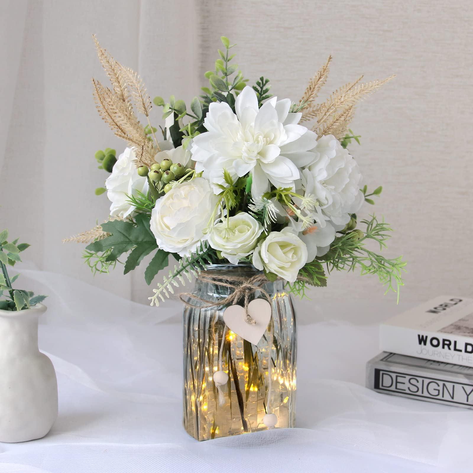 Fresh flowers‌ in glass vases breathe life into your farmhouse bathroom