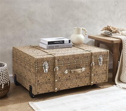 Integrate a statement piece like a vintage​ trunk to your Boho Living Room decor