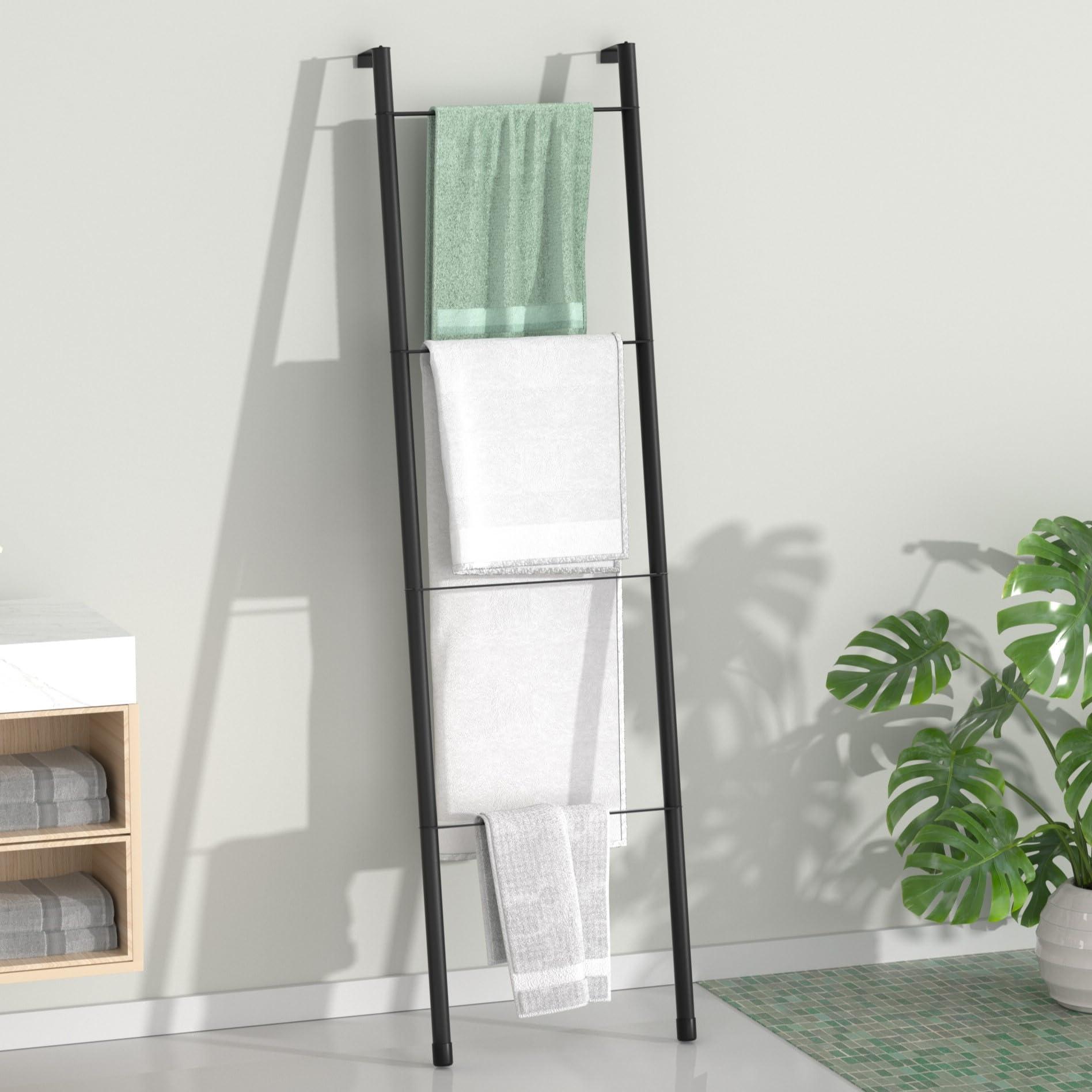 Transform a ladder into a unique towel holder in your eclectic bathroom space