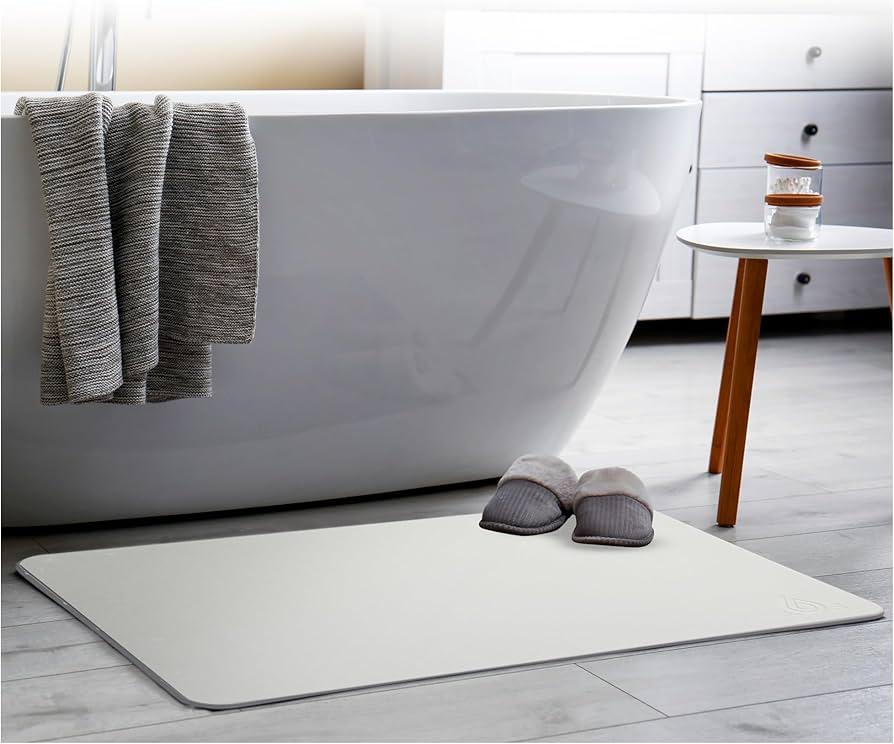 Natural stone ‍bath mat for a ​spa-like ‌boho bathroom experience