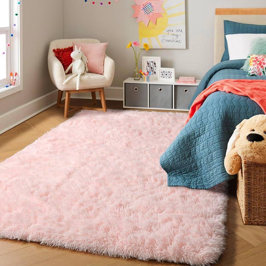 Soft rugs add ⁣comfort and warmth to the girls‍ nursery floor