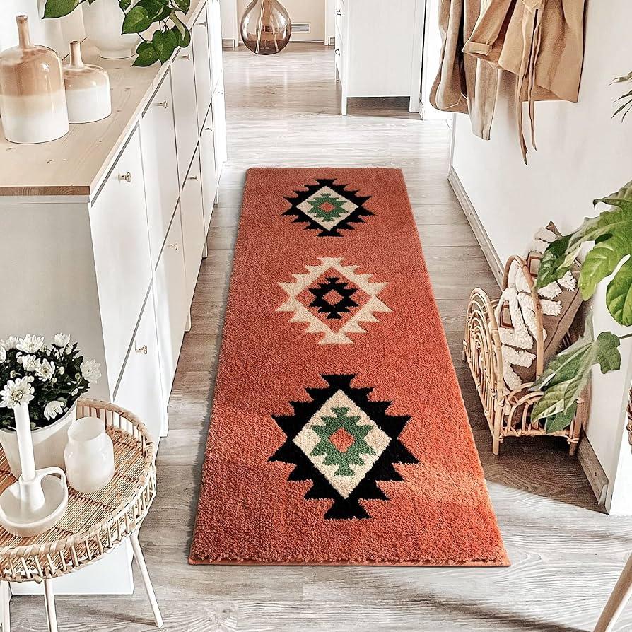 Layer ⁣rugs ​for a cozy feel in your boho ‌bathroom