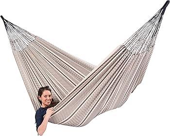 Introduce hammocks for relaxation and comfort in your backyard oasis