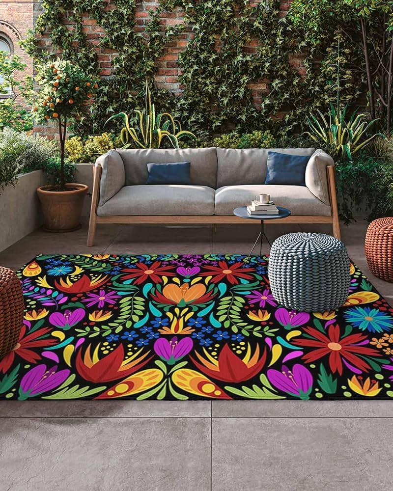 Add a colorful outdoor rug to liven up⁤ your ⁤backyard‍ space