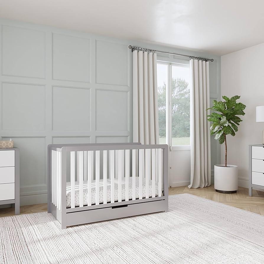 Use a crib with a built-in drawer for your small nursery